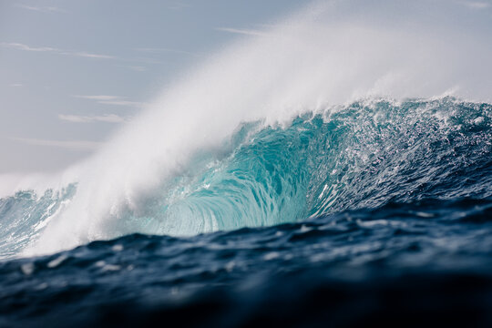 Seascape showing a massive wave breaking in the open sea