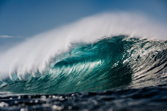 Huge wave breaking in the middle of the open sea