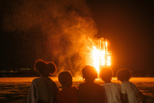 Kids Watching Algiers Holiday Bonfire New Orleans, Louisiana