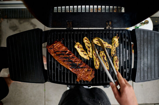 Grilling Meat on Backyard Barbecue