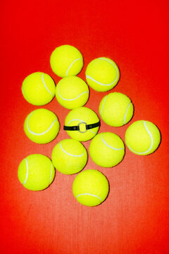 Punch of neon green sport tennis balls and leather choker necklace