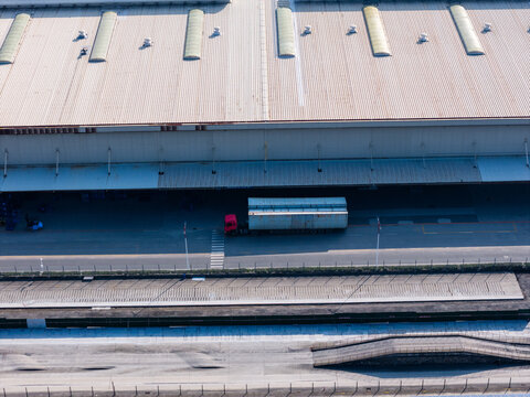 Aerial view of container trucks at factory