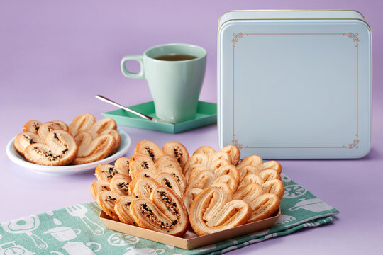 Homemade butterfly cookies were placed on the table with a gift box