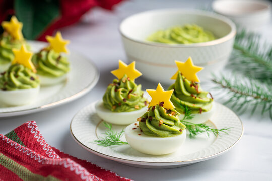 Avocado stuffed eggs. Holiday edition