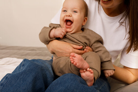 Happy Baby Enjoying Time With mother

