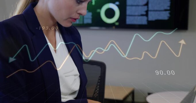 Woman typing on silver laptop initiating animated data and analyzing business wall charts smiling