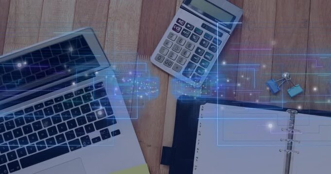 Blue HUD entering left sweeping right, camera panning revealing laptop or calc or planner for overvi