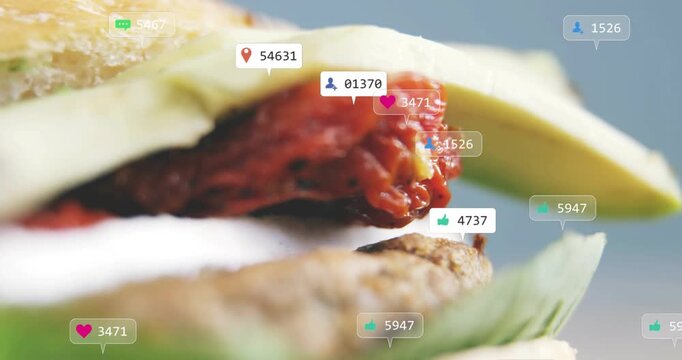 Camera pulling back avocado closeup sparking badges popping clustering over sandwich showing likes