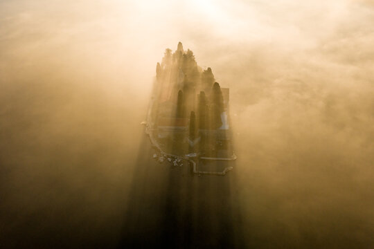 St George Island Church Sunlight Rays Through Fog and Cypress, aerial