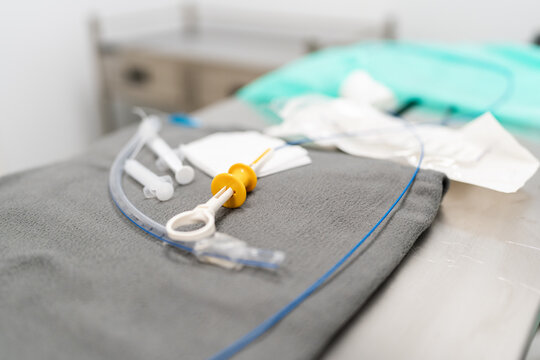 Veterinary surgical instruments laying on operating table