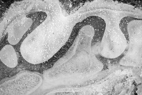 Abstract background with shapes and textures on ice in winter