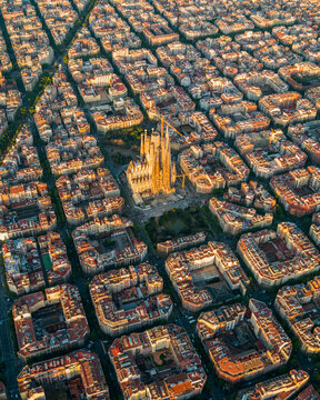 Aerial view of Sagrada Familia and Eixample grid at sunrise, Barcelona