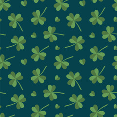 Fototapeta premium Vector seamless pattern for St. Patrick's Day with green shamrocks and hearts on deep blue background.