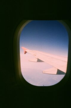Airplane Wing Seen Through Window