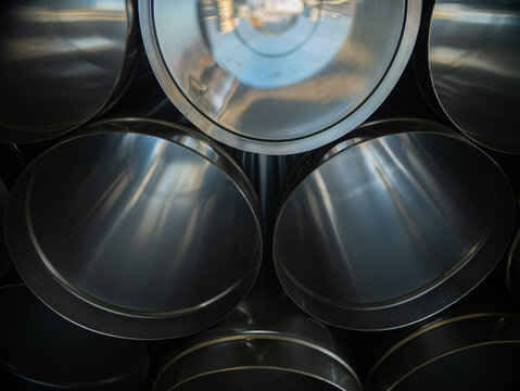 Stacked metal ventilation ducts close-up