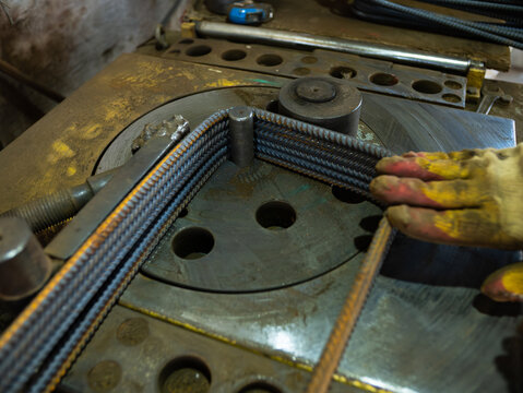 Rebar bending machine in metalworking workshop
