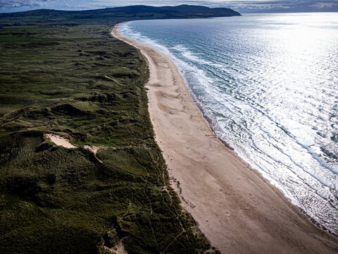 the scenic landscape of Westport Beach in Kintyre, Scotland. 
