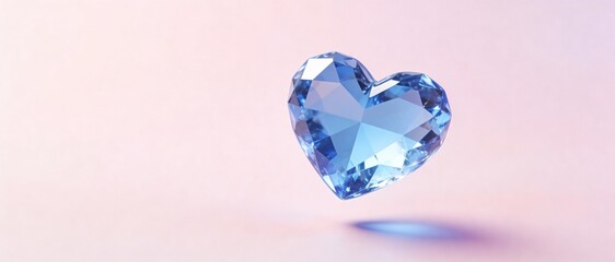 Fototapeta premium Sparkling blue crystal heart floating on a soft pink background with subtle shadow