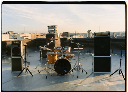 Musical instruments placed across an outdoor terrace