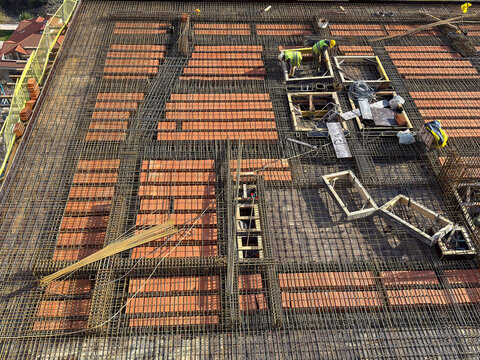 Steel Rebar Reinforcement and Brick Layer Detail at Construction Site