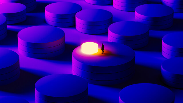 Silhouette of man standing among data servers in data center