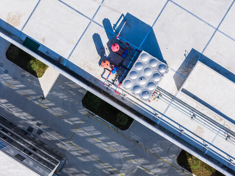 Top-Down View of Rooftop Water Tanks
