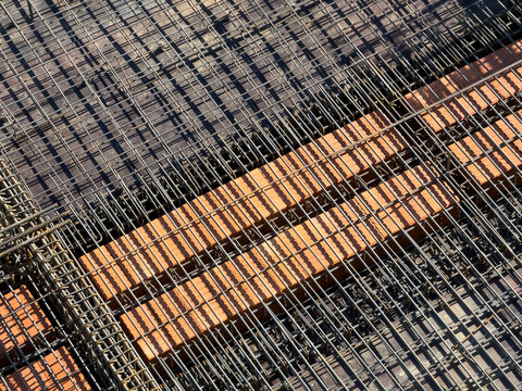 Steel Rebar Reinforcement and Brick Layer Detail at Construction Site