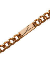 Obraz premium Elegant Gold Chain with Unique Links and Striking Design Element