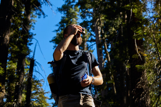 Man snaps photos in nature