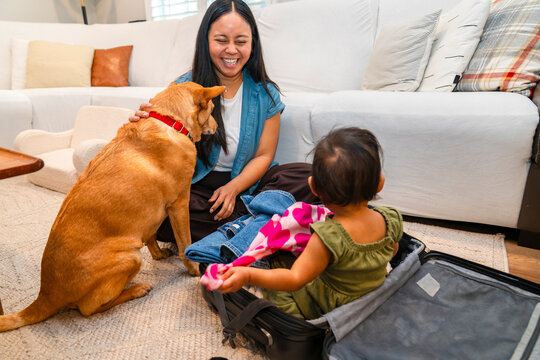 mom packing suitcase