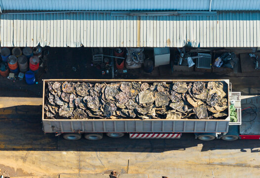 Aerial View of Metal Scrap Truck at Recycling Facility