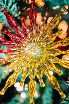 Bright glass decor sparkles on tree