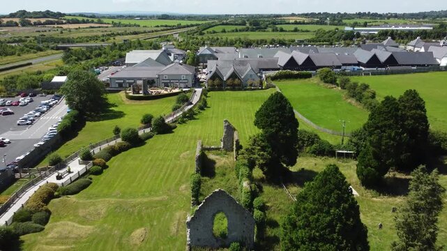 Aerial shot of a modern residential neighborhood with green spaces.