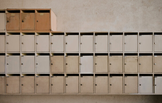 Vintage apartment mailboxes in an old building