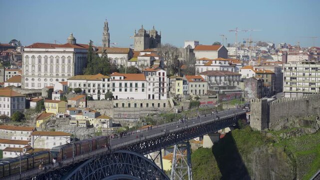 Sunny panoramic view of the Ribeira district and the iconic bridge.