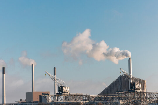 Industrial Plant Emissions at Sunrise