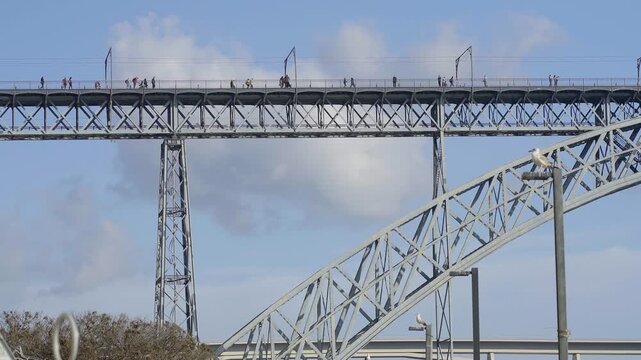 Vertical perspective of the bridge's massive iron pillars.
