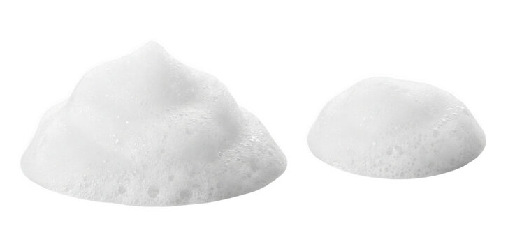 Two white powder piles of fine flour or cornstarch with soft shadow on white background