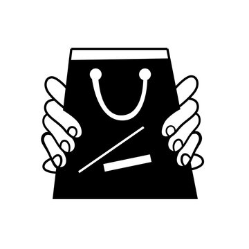 hands holding a shopping bag