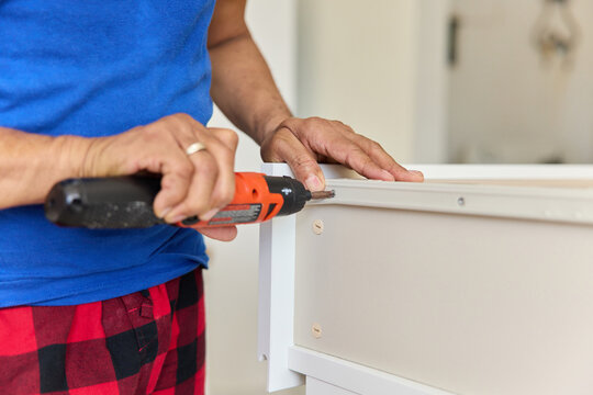 Building Furniture in a Home Workshop With Power Tools in Use