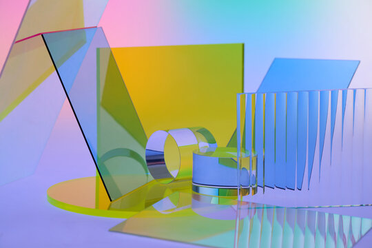 Abstract arrangement of colorful transparent geometric shapes