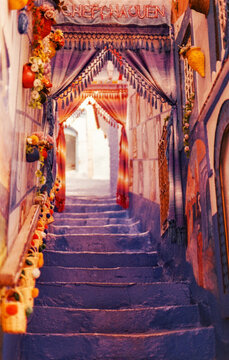 Colorful blue street with stairs in Chefchaouen, Morocco