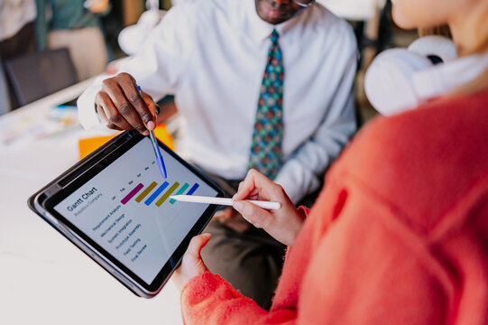 Collaborative business meeting with a focus on analytics