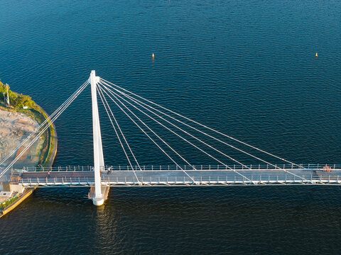 New suspension under construction crossing a coastal canal