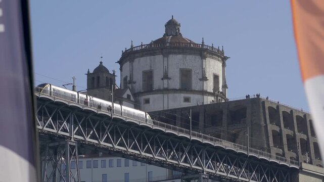 Metro train arriving at the station next to the Serra do Pilar monastery.