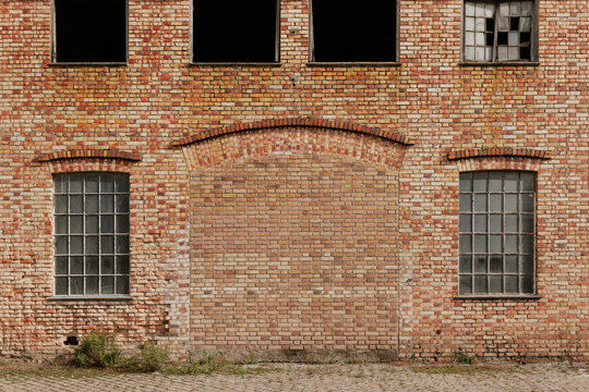 Brick facade of an abandoned industrial building