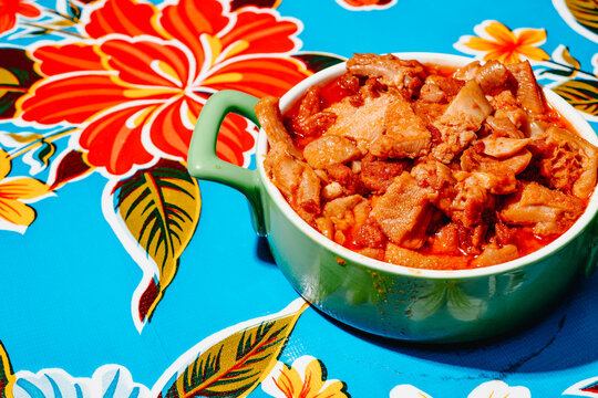 Spanish callos con jamon served in a ceramic pot