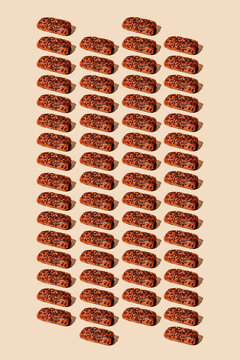 pattern of pains au chocolat con a beige background