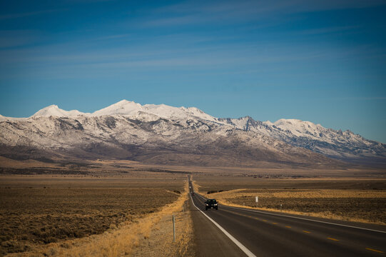 Snow covered mountains by the town of Wells Nevada, along Highway 93,  USA.