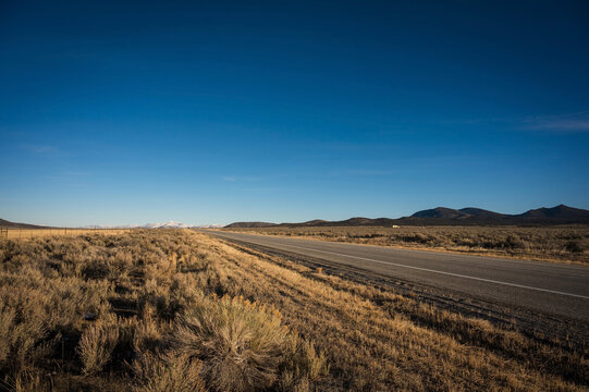 Snow covered mountains by the town of Wells Nevada, near Highway 93,  USA.